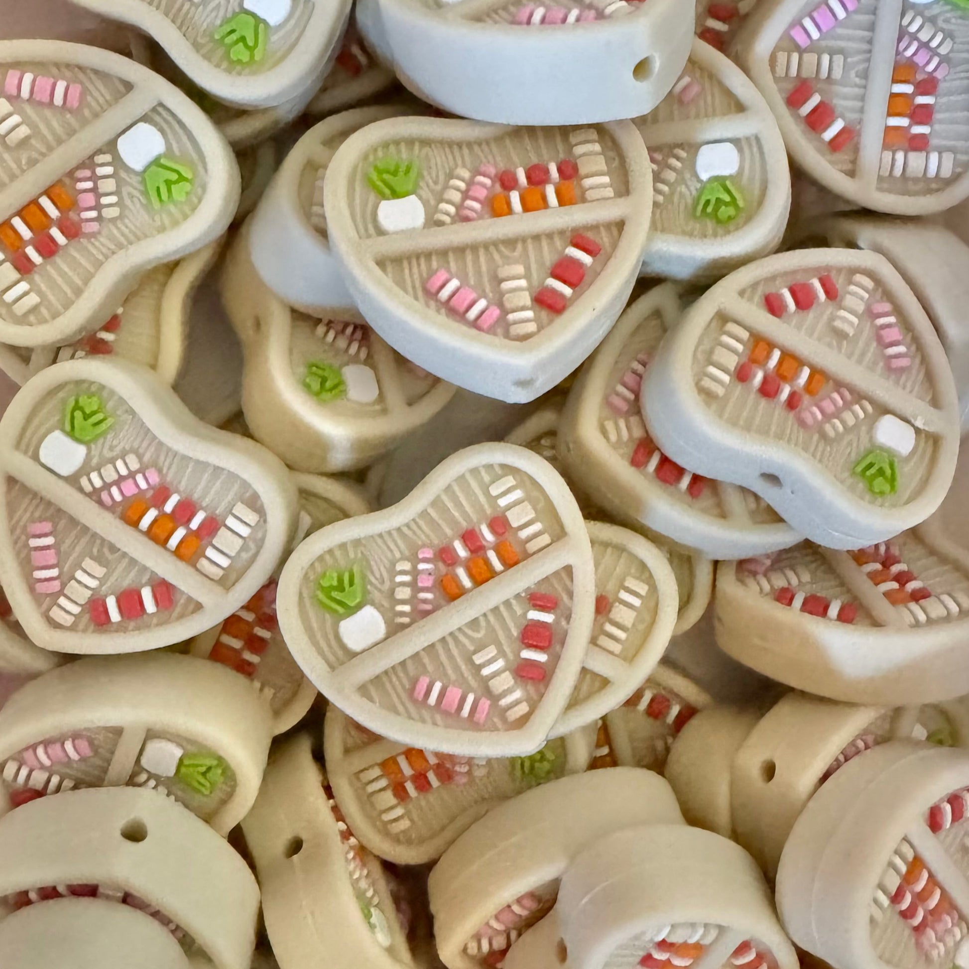Collection of decorative ceramic slices on a white background